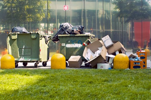 Commercial waste removal trucks at work in London